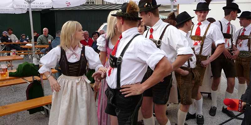 Rupertikirtag scene with locals in Tracht