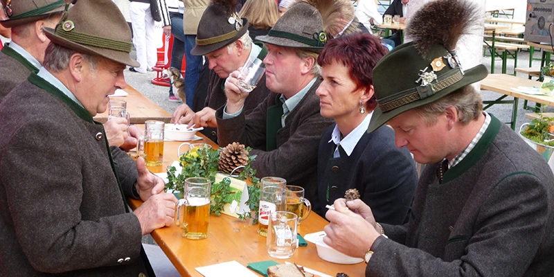Rupertikirtag festival scene with brass band and food stalls