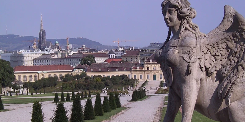 Upper Belvedere Palace facade reflected in the pool