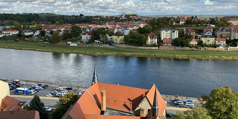 View over Meissen's red rooftops to the Elbe and the hills beyond